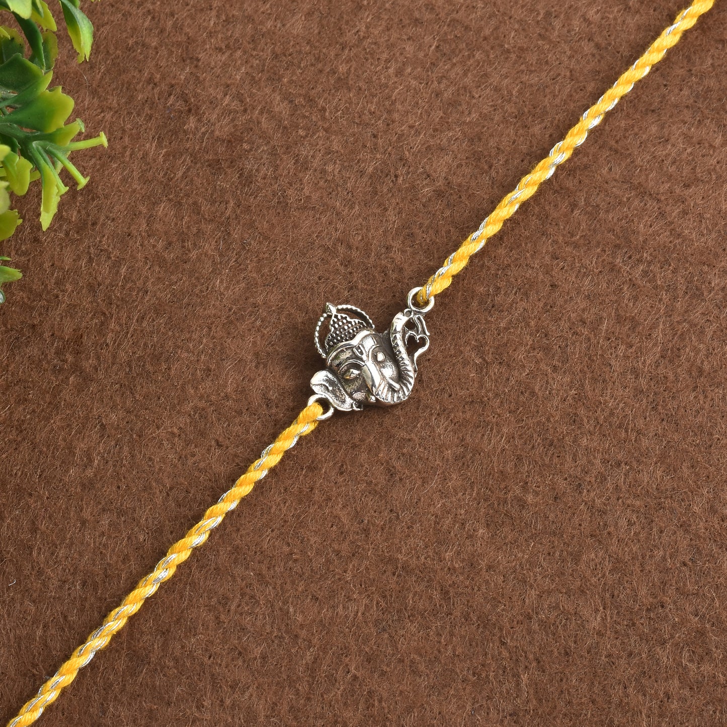 Silver Ganesha Face Rakhi
