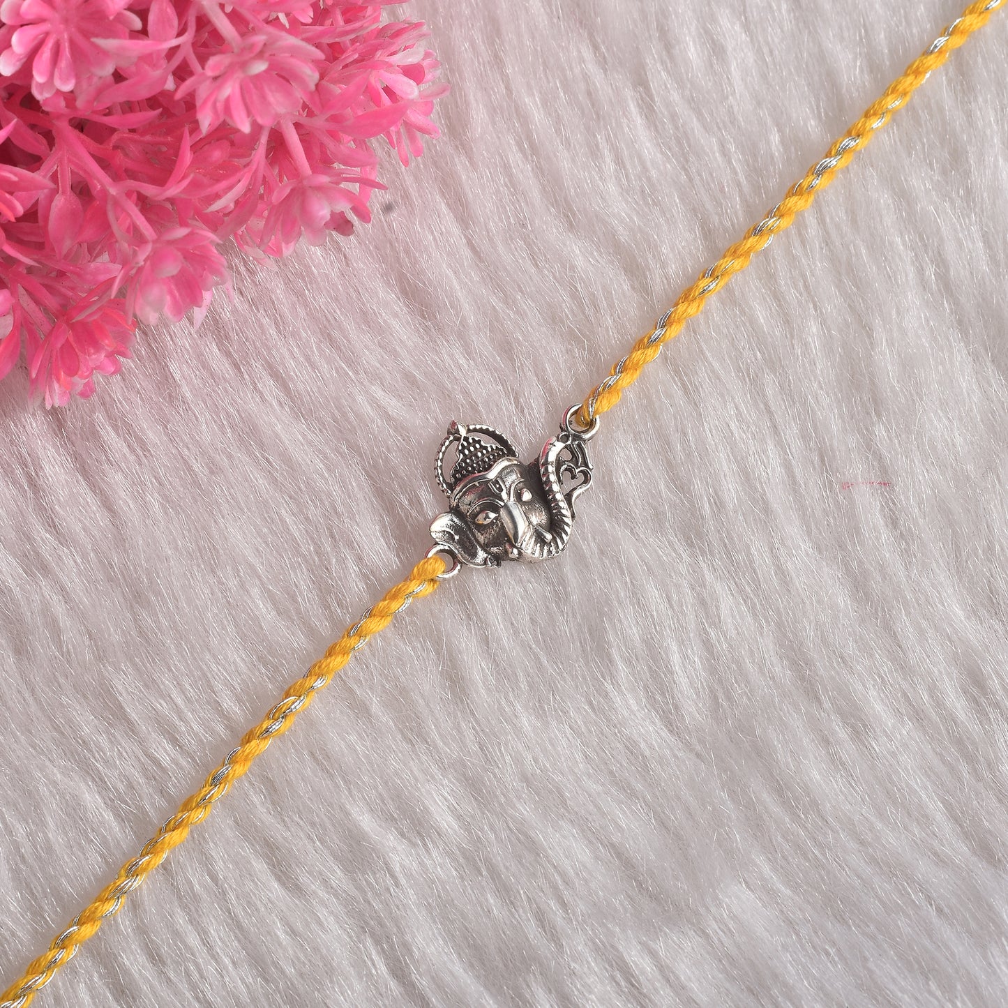 Silver Ganesha Face Rakhi