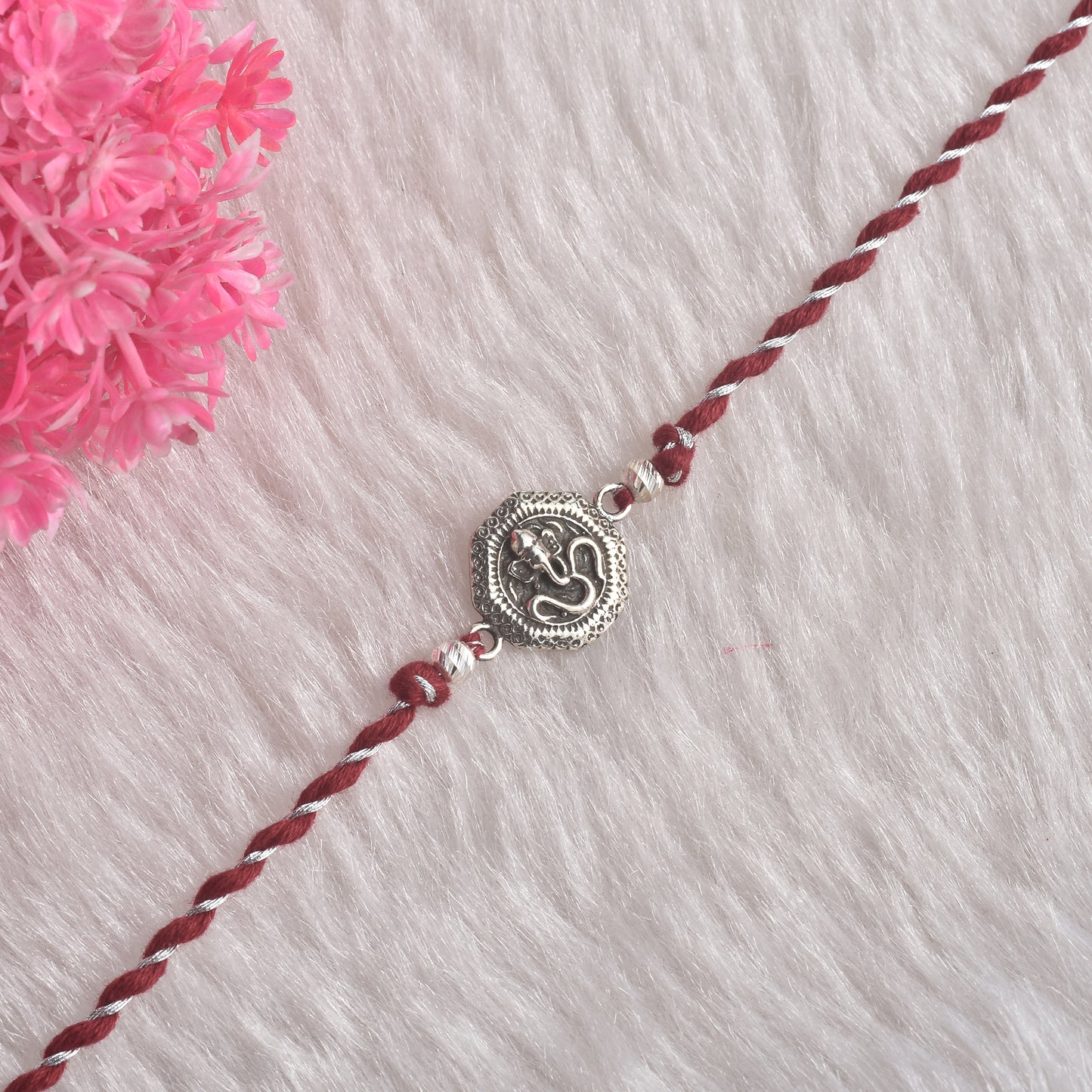 Silver Om Ganesha Rakhi